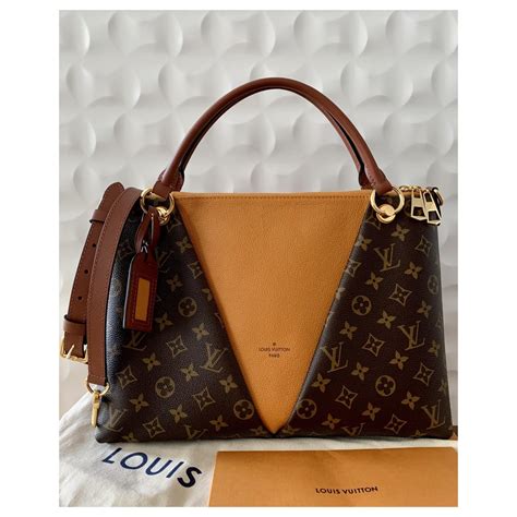 louis vuitton tasche damen handgelenktasche